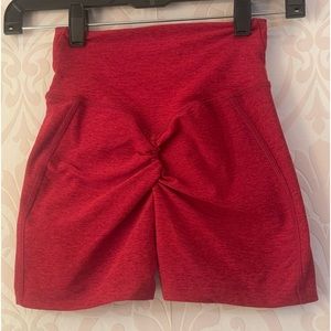 Bombshell sportswear cross front scrunch butt gym biker shorts Sunset red